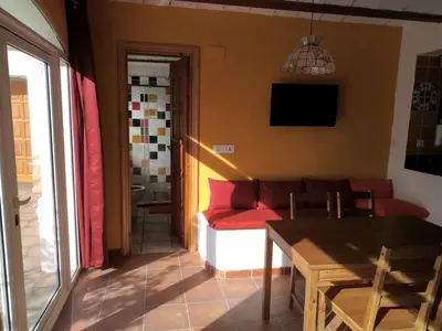 Una televisión o centro de entretenimiento en Allotjament Bogues