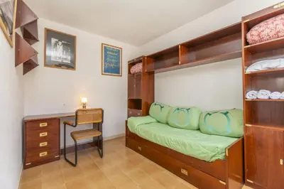 Cama o camas de una habitación en La Paloma