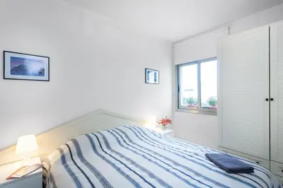 Cama o camas de una habitación en Perfect Apartment near the beach and Barcelona