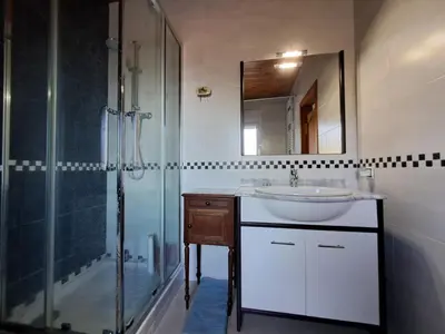 Un baño de Villa Xaloc 12 pax piscina privada - 15km Lloret de Mar