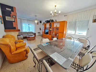 Zona de estar de Villa Xaloc 12 pax piscina privada - 15km Lloret de Mar