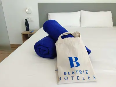 Cama o camas de una habitación en Hotel Calella by Beatriz Hoteles