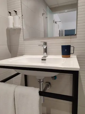 Un baño de Hotel Calella by Beatriz Hoteles