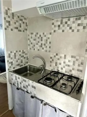 Una cocina o zona de cocina en ZEcamping 3 animé - proximité directe plages de la costa brava