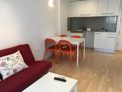 Una cocina o zona de cocina en Apartaments Muntaner I
