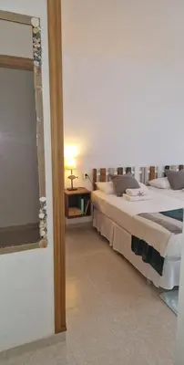 Cama o camas de una habitación en Apartamento a un paso de la playa
