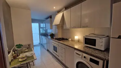 Una cocina o zona de cocina en Apartamento a un paso de la playa