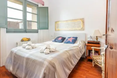 Cama o camas de una habitación en Oasis en el centro de Palafrugell