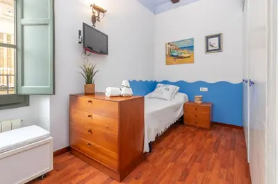 Cama o camas de una habitación en Oasis en el centro de Palafrugell