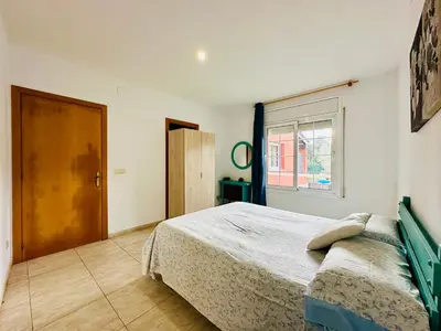 Cama o camas de una habitación en Oasi CostaBravaSi