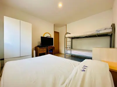 Cama o camas de una habitación en Oasi CostaBravaSi
