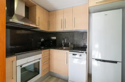 Una cocina o zona de cocina en Nicolle Apartment Lloret de Mar