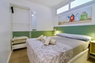 Cama o camas de una habitación en Hauzify I Apartament Nàutic
