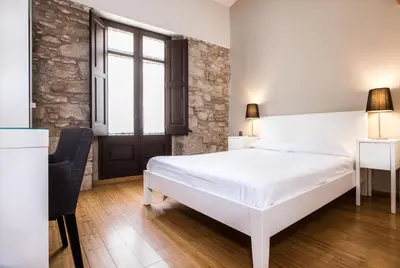 Cama o camas de una habitación en Girona Housing Ginesta 9