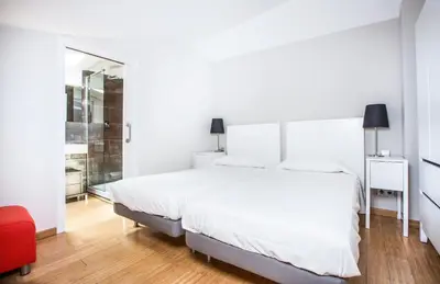 Cama o camas de una habitación en Girona Housing Ginesta 9