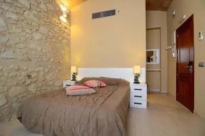 Cama o camas de una habitación en Petit Pals