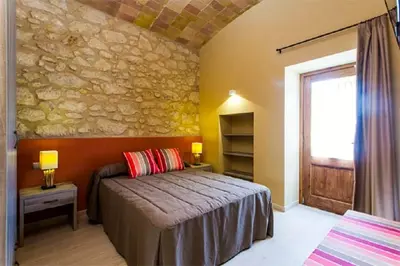 Cama o camas de una habitación en Petit Pals