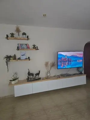 Una televisión o centro de entretenimiento en Villa Bleu Azur