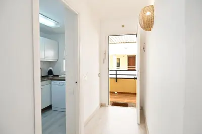 Una cocina o zona de cocina en Apartamento con piscina en Sant Pol de Mar