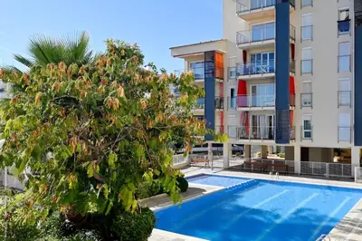 Piscina en o cerca de Apartamento con piscina en Sant Pol de Mar