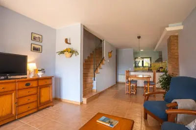 Una televisión o centro de entretenimiento en Can Pujol - Casa Rural 16-20 personas