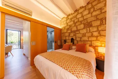 Cama o camas de una habitación en Bravissimo Calderers, Monthly Apartments