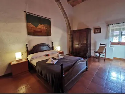 Cama o camas de una habitación en Masia Can Tibau
