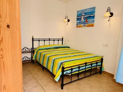Cama o camas de una habitación en Casa Mas Tomasi Pals