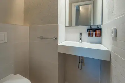Un baño de Alta House Apartments Sa Tuna Playa