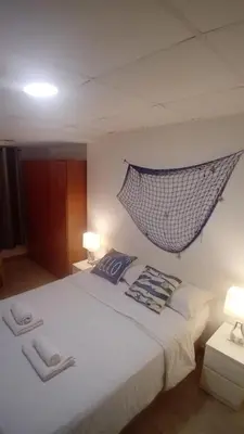 Cama o camas de una habitación en Piso fantástico- a 2 minutos andando del mar