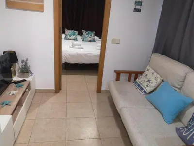 Cama o camas de una habitación en Piso fantástico- a 2 minutos andando del mar