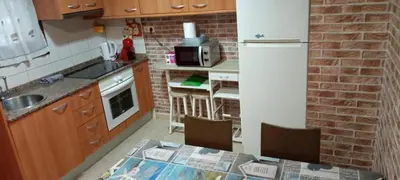 Una cocina o zona de cocina en Piso fantástico- a 2 minutos andando del mar