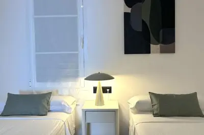 Cama o camas de una habitación en LETS HOLIDAYS Dúplex Frente Al Mar, Piscina Panorámica, Dos Pkg