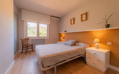 Cama o camas de una habitación en L' Olivera