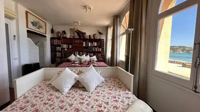 Cama o camas de una habitación en apartamento con jardín a 11 metros de la playa B2