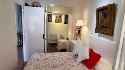 Cama o camas de una habitación en apartamento con jardín a 11 metros de la playa B2