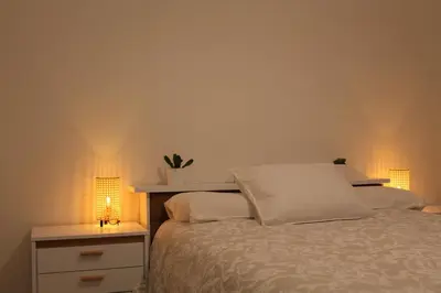 Cama o camas de una habitación en Apto el Piset, acogedor y céntrico del Montseny