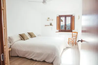 Cama o camas de una habitación en Cal Teixidor de Cartellà, Sant Gregori GIRONA