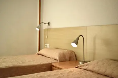 Cama o camas de una habitación en Residència Universitaria Pare Claret