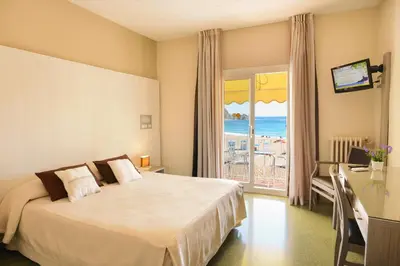 Cama o camas de una habitación en Hotel Capri