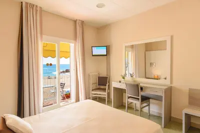 Cama o camas de una habitación en Hotel Capri