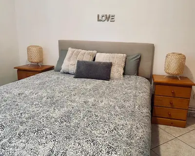 Cama o camas de una habitación en Hauzify I Apartament Gaviota