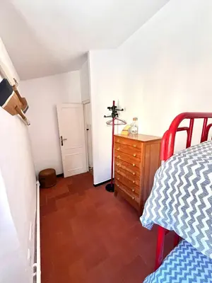 Cama o camas de una habitación en Casa con jardín y barbacoa
