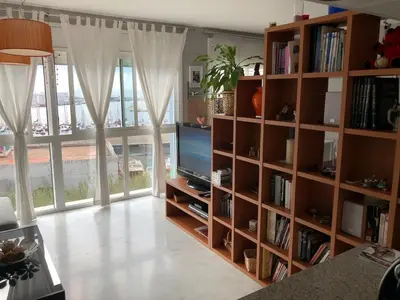 Una televisión o centro de entretenimiento en Loft en Arenys de Mar