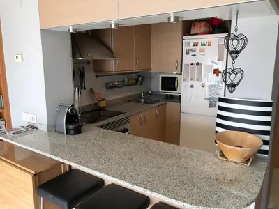 Una cocina o zona de cocina en Loft en Arenys de Mar