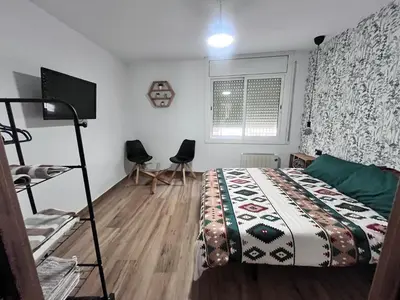 Cama o camas de una habitación en Habitació amb encant a Blanes