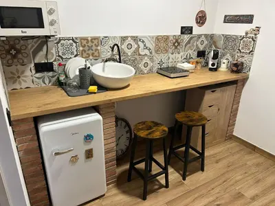 Una cocina o zona de cocina en Habitació amb encant a Blanes