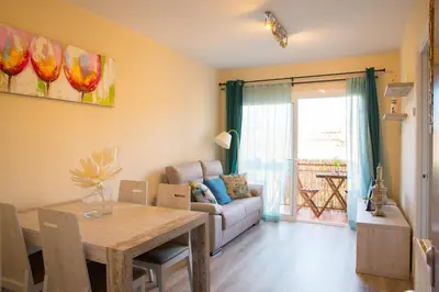 Zona de estar de Lloguer30 Blaumar is family-friendly and centrally located