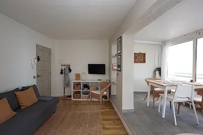 Una televisión o centro de entretenimiento en Apartamento Nis