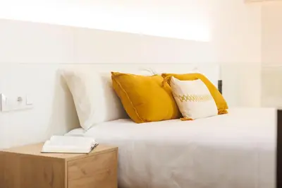 Cama o camas de una habitación en Bravissimo Ballesteries 40, Barri Vell duplex